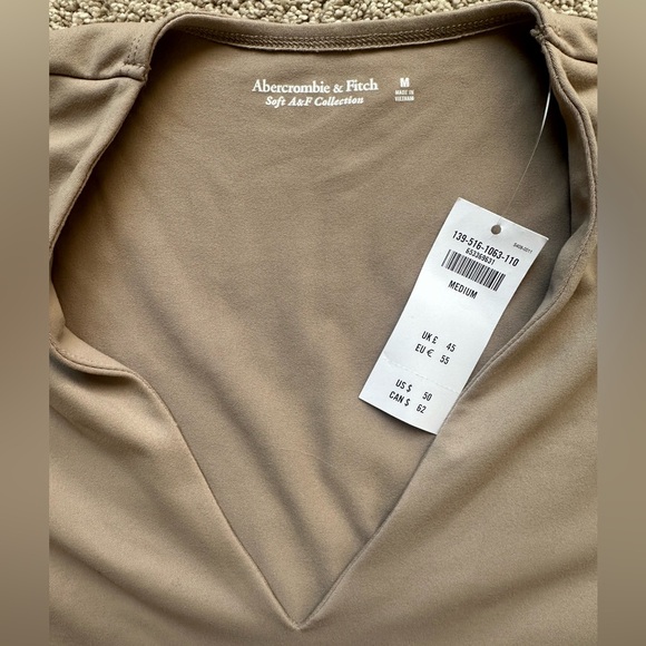 NEW WITH TAGS! Abercrombie & Fitch beige long sleeve bodysuit - medium. - Picture 2 of 4